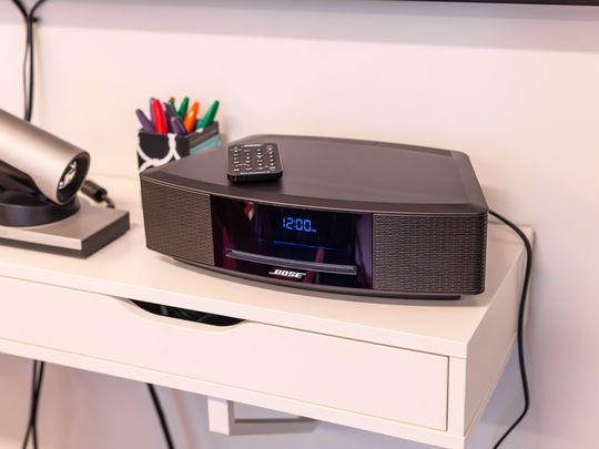 CD player on a shelf.