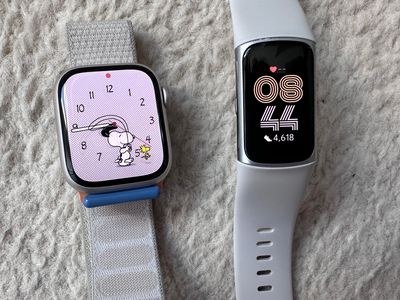 Apple Watch Series 9 and Fitbit Charge 6.