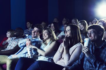 Picture of an audience enjoying a movie at a theater