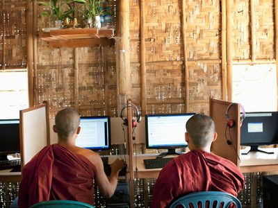 Monks at a computer